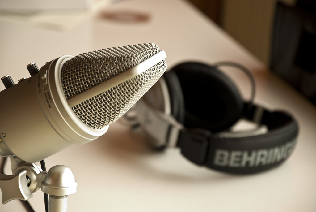 How can a small business leverage the power of podcasting to grow their business?